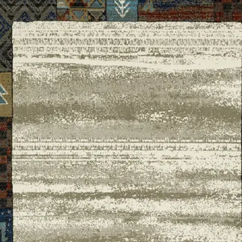 10' X 13' Ivory Tan And Blue Patchwork Area Rug