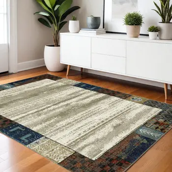 4' X 6' Ivory Tan And Blue Patchwork Area Rug