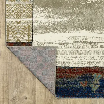 4' X 6' Ivory Tan And Blue Patchwork Area Rug