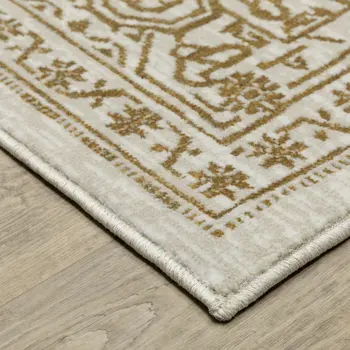 7' X 10' Ivory And Gold Oriental Area Rug