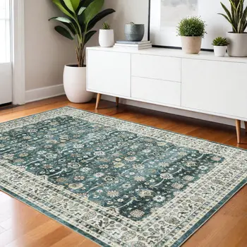 4' X 6' Teal And Ivory Oriental Distressed Area Rug