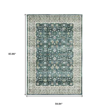 5' X 7' Teal And Ivory Oriental Distressed Area Rug