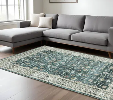 8' X 10' Teal And Ivory Oriental Distressed Area Rug