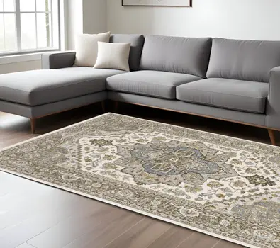 8' X 11' Ivory And Gold Medallion Distressed Area Rug With Fringe