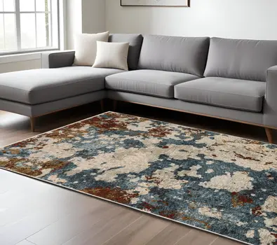 10' X 13' Beige Rust And Teal Abstract Distressed Area Rug With Fringe