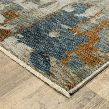 8' X 11' Beige Rust And Teal Abstract Distressed Area Rug With Fringe