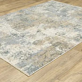 8' X 11' Beige And Blue Abstract Distressed Area Rug With Fringe