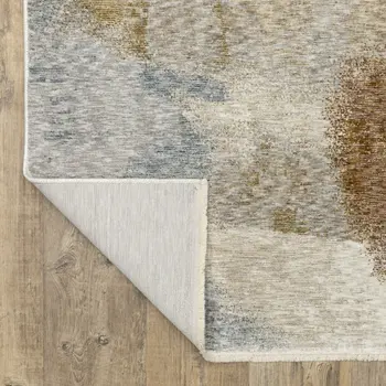 7' X 10' Beige And Rust Abstract Distressed Area Rug With Fringe