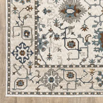5' X 8' Ivory Burnt Orange And Blue Oriental Area Rug