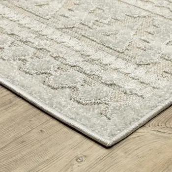 5' X 8' Beige And Ivory Tribal Area Rug