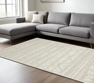 7' X 10' Beige And Ivory Tribal Area Rug