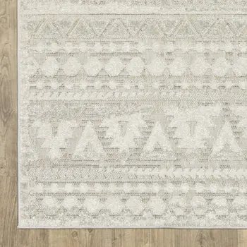 7' X 10' Beige And Ivory Tribal Area Rug