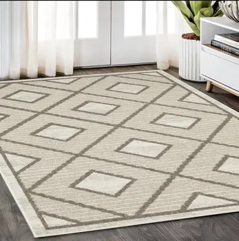 5' X 8' Beige And Brown Geometric Area Rug