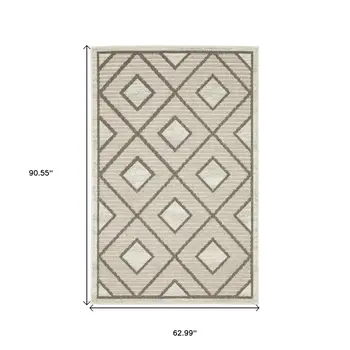 5' X 8' Beige And Brown Geometric Area Rug