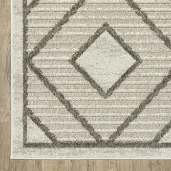 7' X 10' Beige And Brown Geometric Area Rug