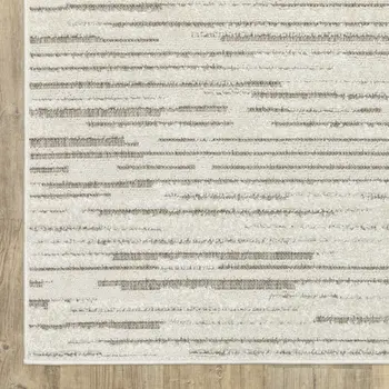 7' X 10' Ivory And Brown Striped Distressed Area Rug