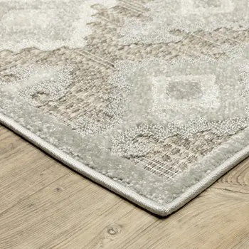 5' X 8' Beige And Gray Oriental Area Rug