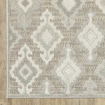 5' X 8' Beige And Gray Oriental Area Rug