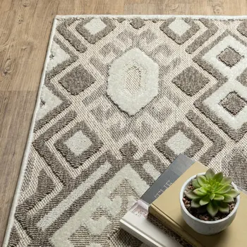 5' X 8' Brown And Beige Tribal Area Rug