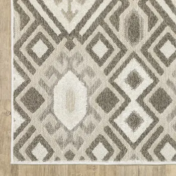 5' X 8' Brown And Beige Tribal Area Rug