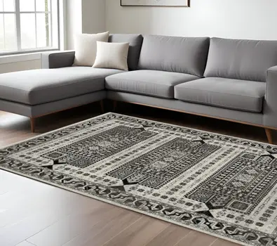 7' X 10' Ivory And Charcoal Oriental Area Rug With Fringe