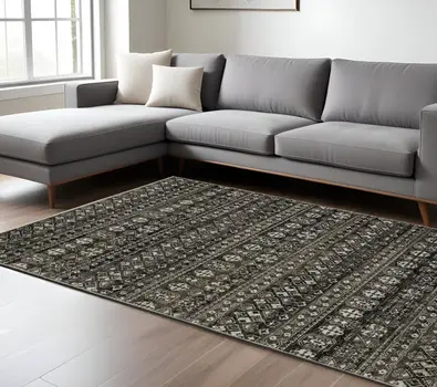 7' X 10' Black And Gray Tribal Area Rug With Fringe