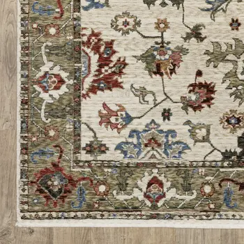 5' X 8' Ivory And Green Oriental Area Rug With Fringe
