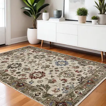 4' X 6' Ivory And Green Oriental Area Rug With Fringe