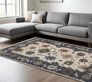 8' X 11' Blue And Ivory Floral Area Rug With Fringe