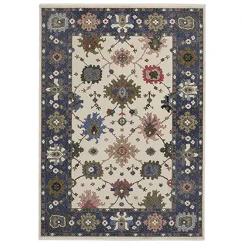 8' X 11' Blue And Ivory Floral Area Rug With Fringe