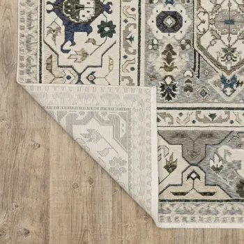 8' X 11' Ivory And Blue Oriental Area Rug With Fringe