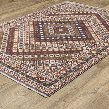 7' X 10' Ivory Red And Tan Diamond Area Rug With Fringe
