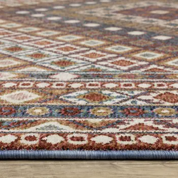7' X 10' Ivory Red And Tan Diamond Area Rug With Fringe
