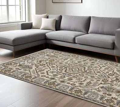 8' X 11' Ivory And Rust Floral Area Rug With Fringe