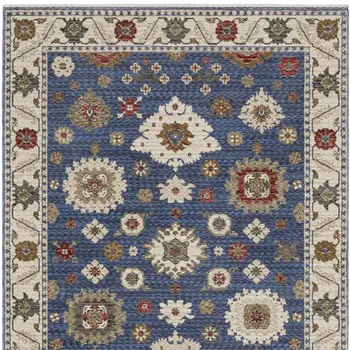 5' X 8' Blue And Ivory Floral Area Rug With Fringe