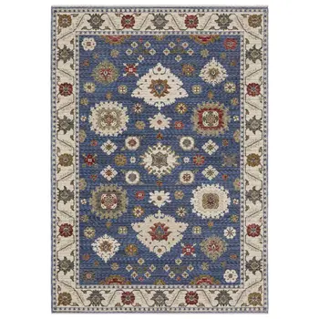 5' X 8' Blue And Ivory Floral Area Rug With Fringe
