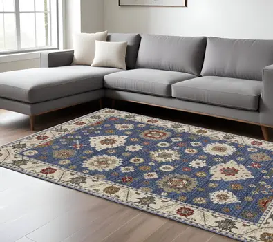 10' X 13' Blue And Ivory Floral Area Rug With Fringe