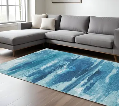 8' X 10' Sky Blue And Ivory Abstract Distressed Area Rug