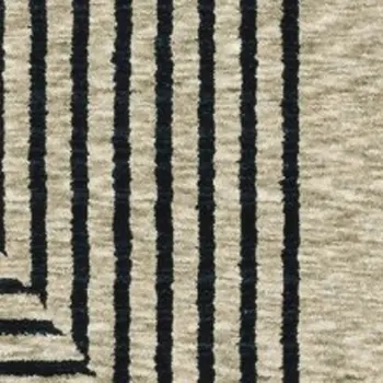 5' X 8' Beige Geometric Area Rug With Fringe