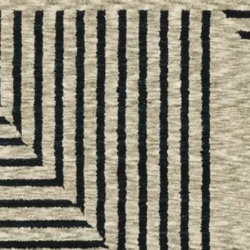 8' X 11' Beige Geometric Area Rug With Fringe