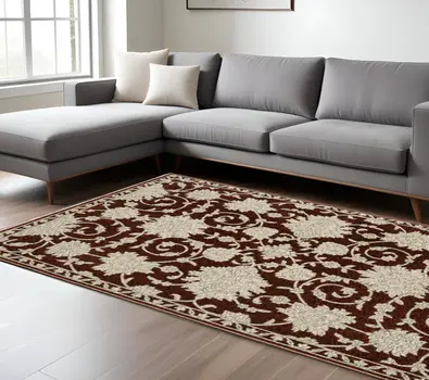 8' X 11' Beige Floral Area Rug With Fringe