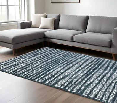 8' X 11' Teal And Ivory Striped Distressed Area Rug