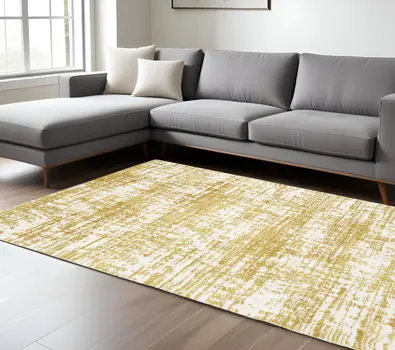 10' X 13' Gold And Ivory Abstract Area Rug