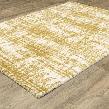 4' X 6' Gold And Ivory Abstract Area Rug