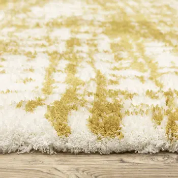 4' X 6' Gold And Ivory Abstract Area Rug