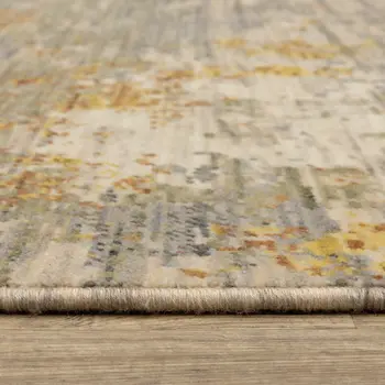 2' X 3' Beige And Gold Abstract Area Rug With Fringe