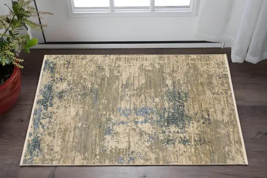 2' X 3' Beige And Blue Abstract Area Rug With Fringe