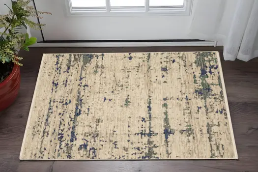 2' X 3' Beige And Green Abstract Area Rug With Fringe