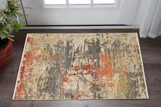 2' X 3' Beige And Pink Abstract Area Rug With Fringe