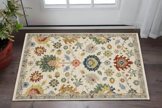 2' X 3' Ivory Red And Blue Oriental Area Rug With Fringe